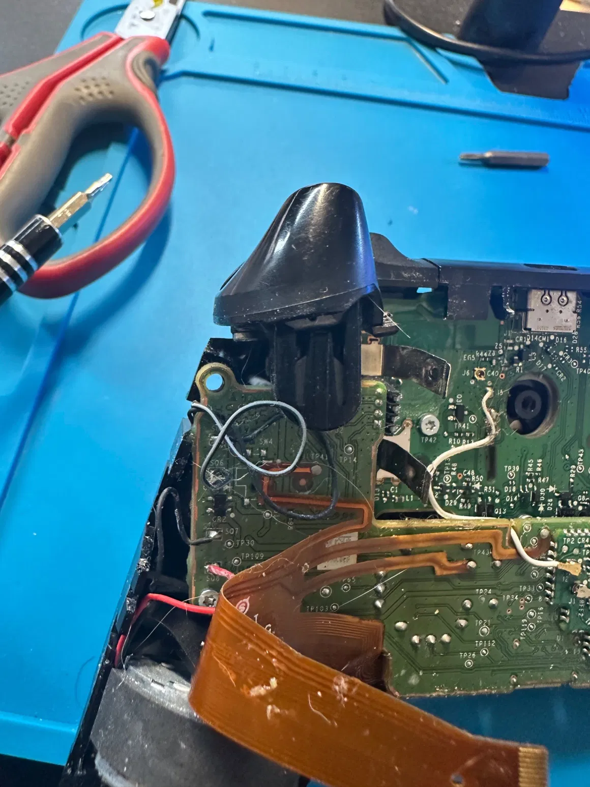 Close-up micro-soldering on controller circuit board