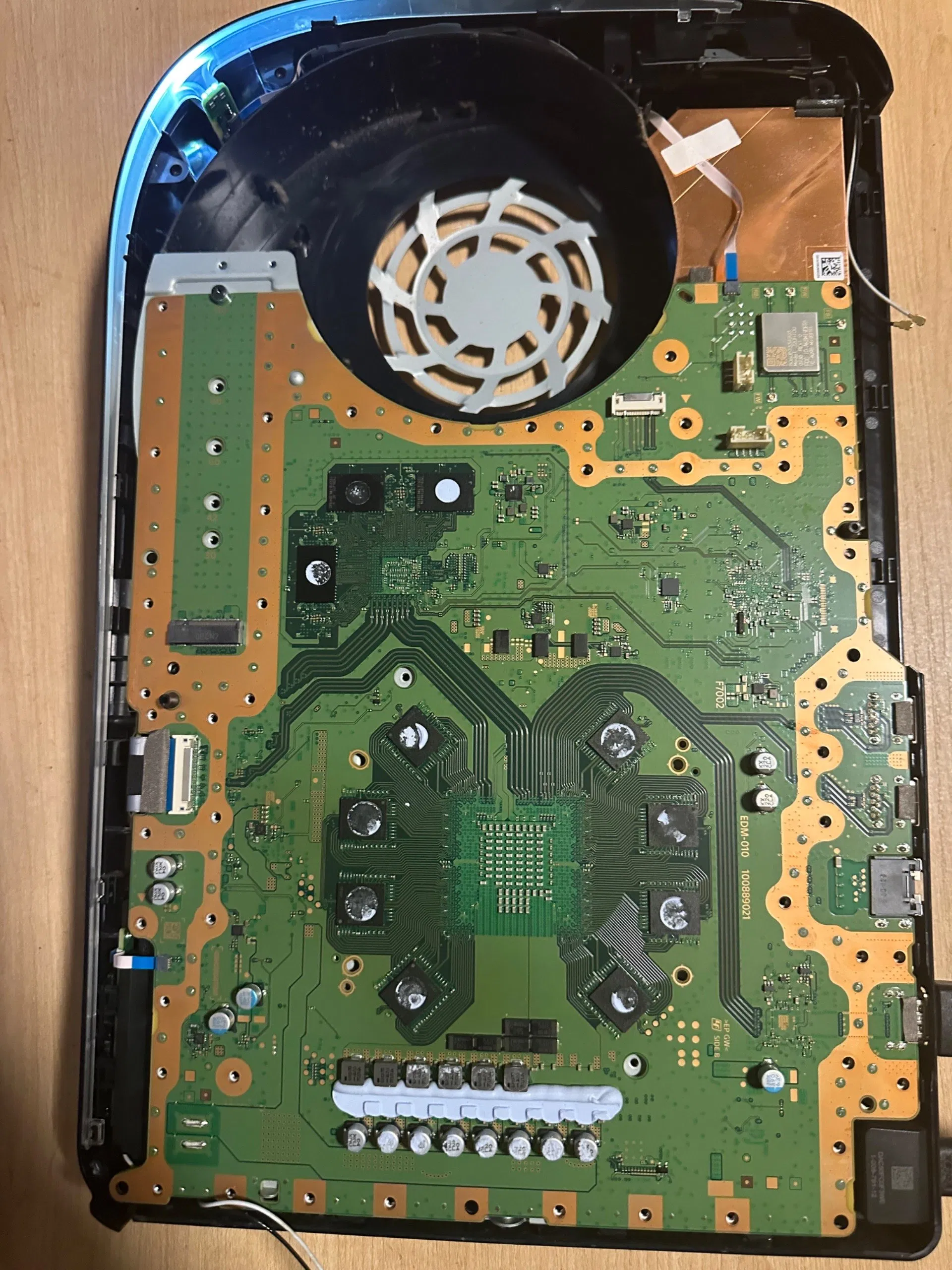 PlayStation motherboard and cooling fan assembly