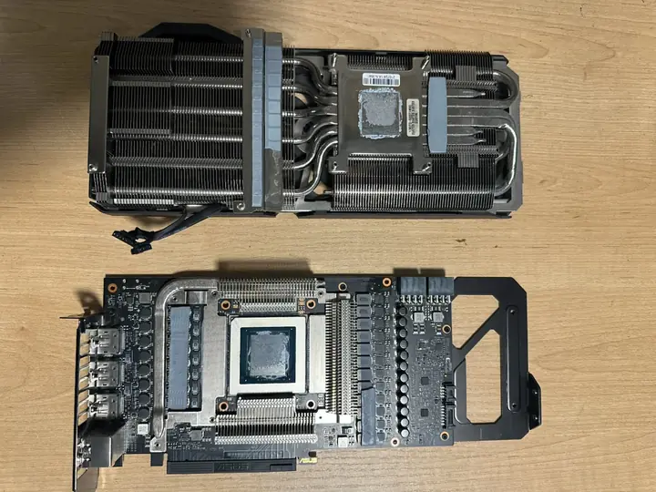 Graphics card cooler and board disassembled for repair on the FlexRepairs bench