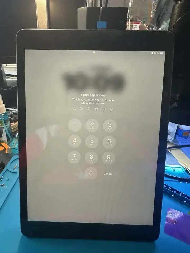 Touch ID iPad powered on after display repair for final testing