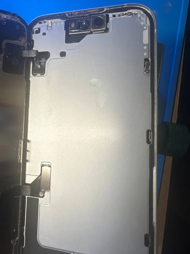 Inside of an iPhone frame cleaned and prepared for a new screen