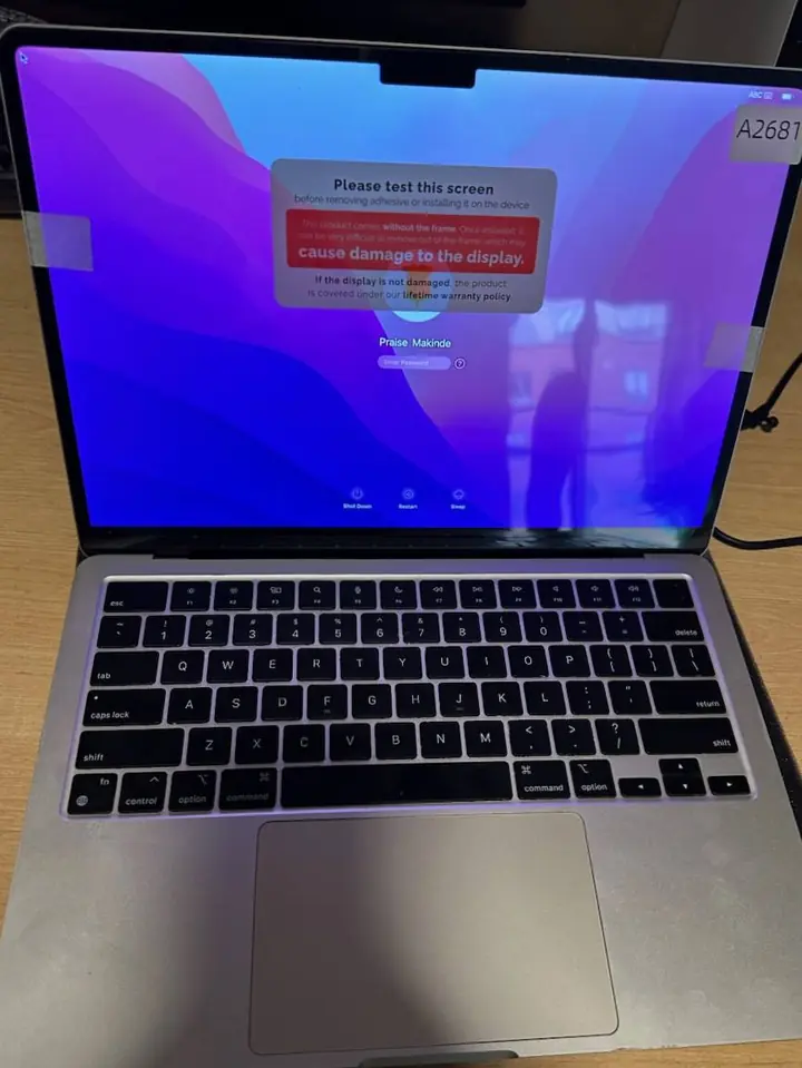 Laptop replacement screen displaying a clear working image during testing