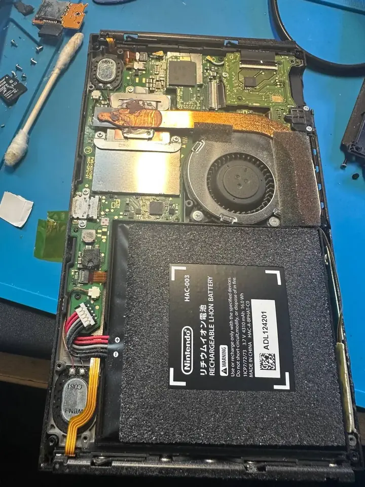 New battery installed inside an opened Nintendo Switch