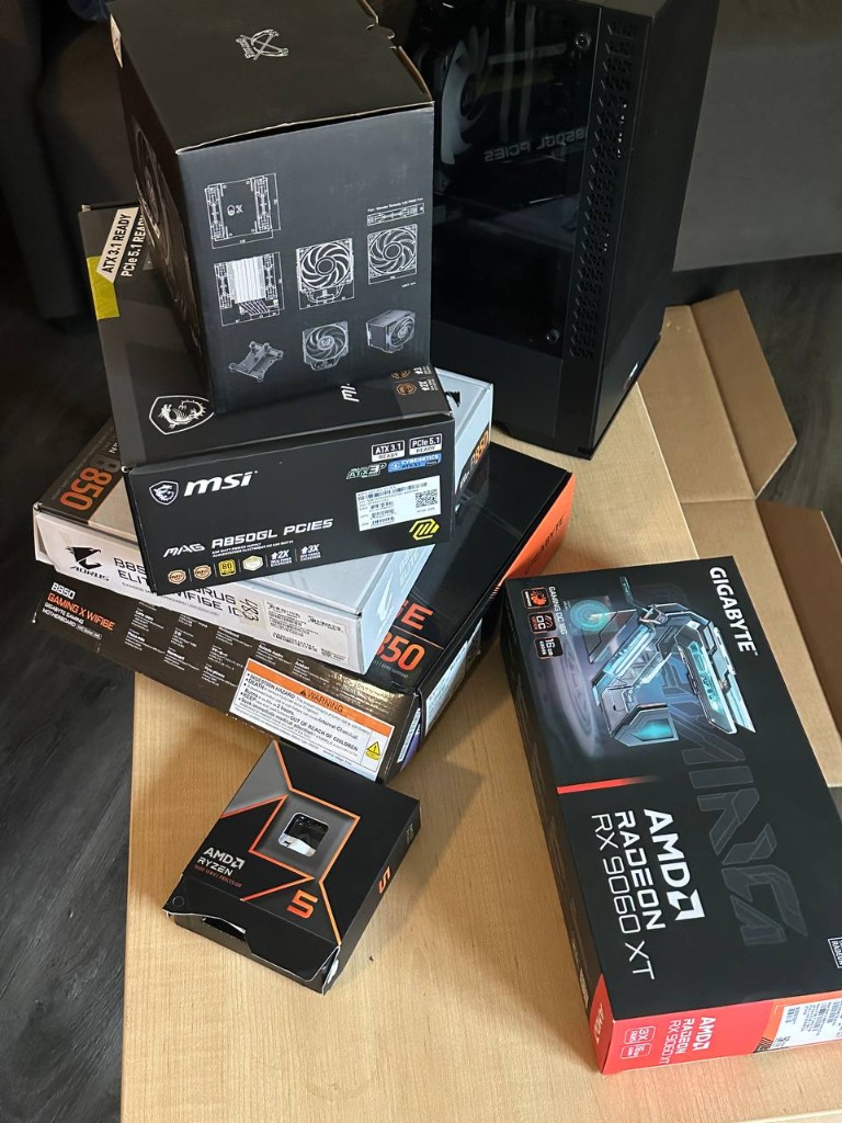 High performance PC components: AMD Ryzen 5, Radeon RX 9060 XT, B650 motherboard, MSI PSU