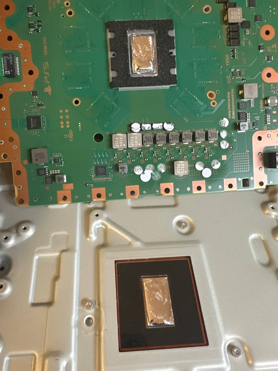 PlayStation 5 motherboard and liquid metal service area