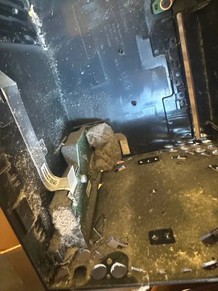 Dust packed inside an Xbox Series X chassis before cleaning