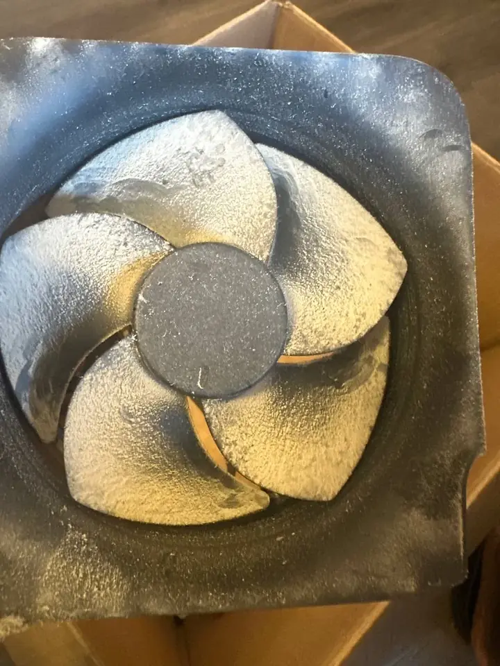 Xbox Series X cooling fan blades coated in dust