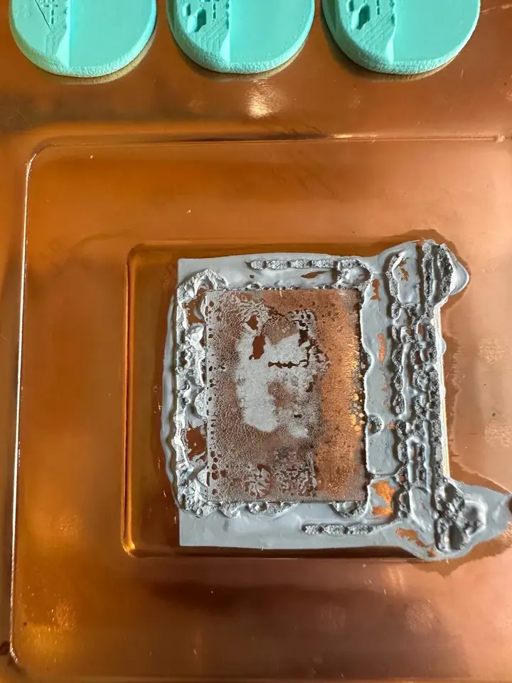 Dried thermal paste imprint on the Xbox Series X copper heatsink before cleaning