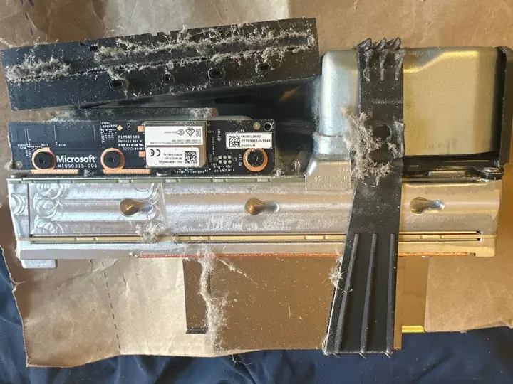Lint caught in the Xbox Series X SSD and wireless board assembly
